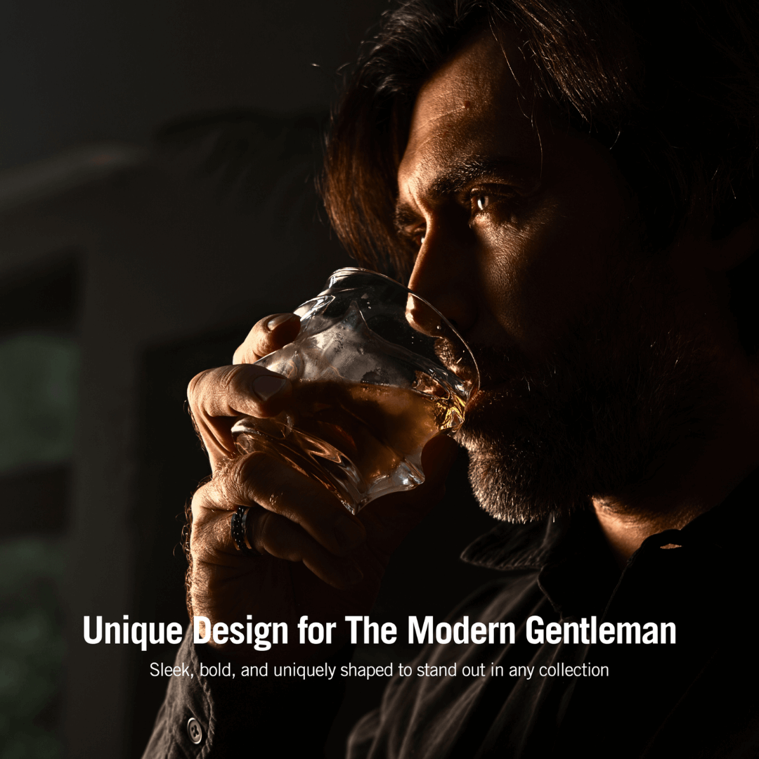 Man drinking from a glass with text 'Unique Design for The Modern Gentleman' on a dark background