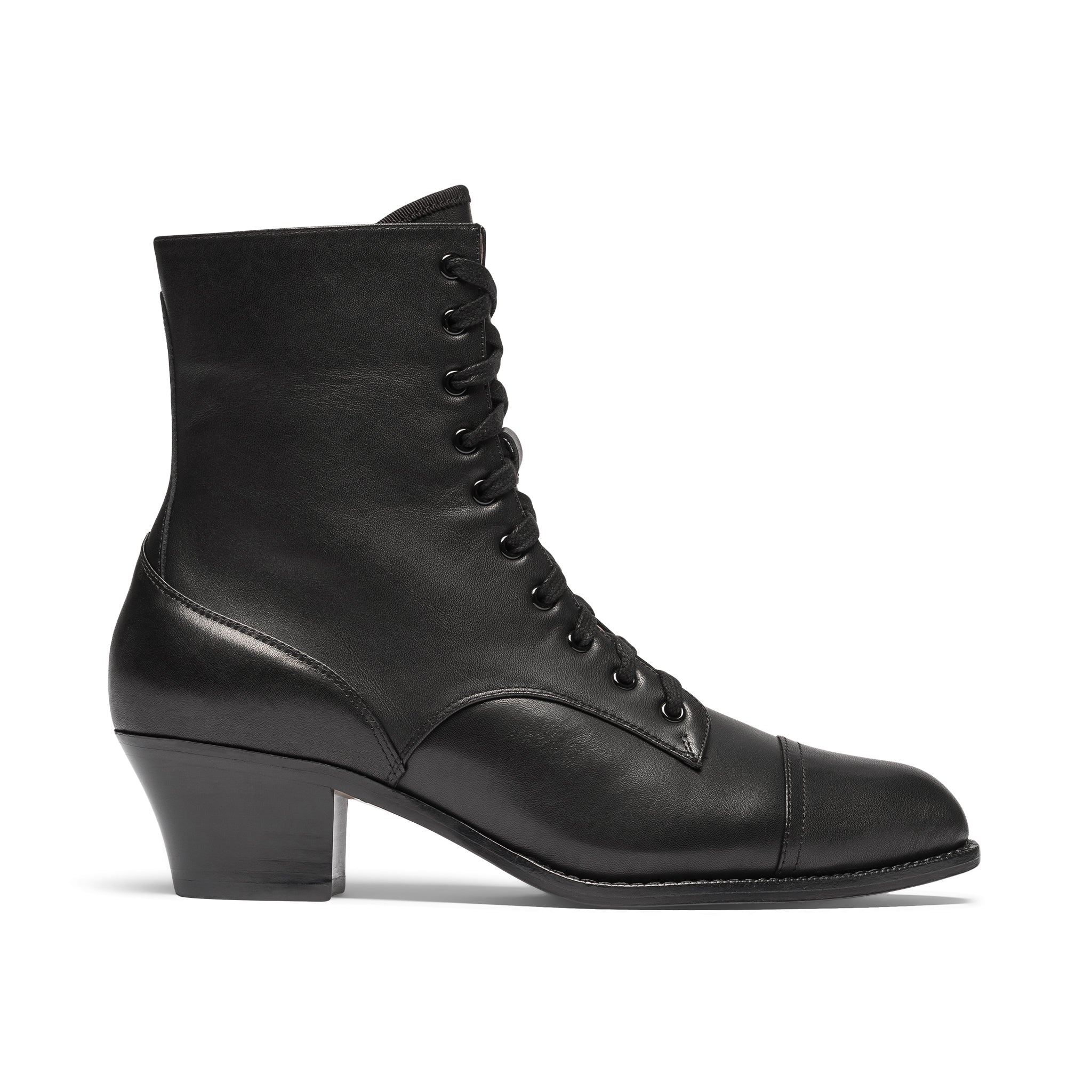 Red ankle boot on a light gray background