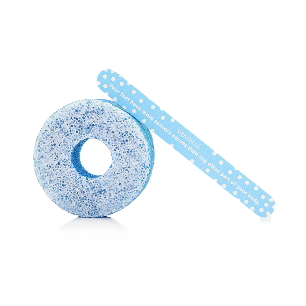 Blue textured donut-shaped object with a blue straw on a white background