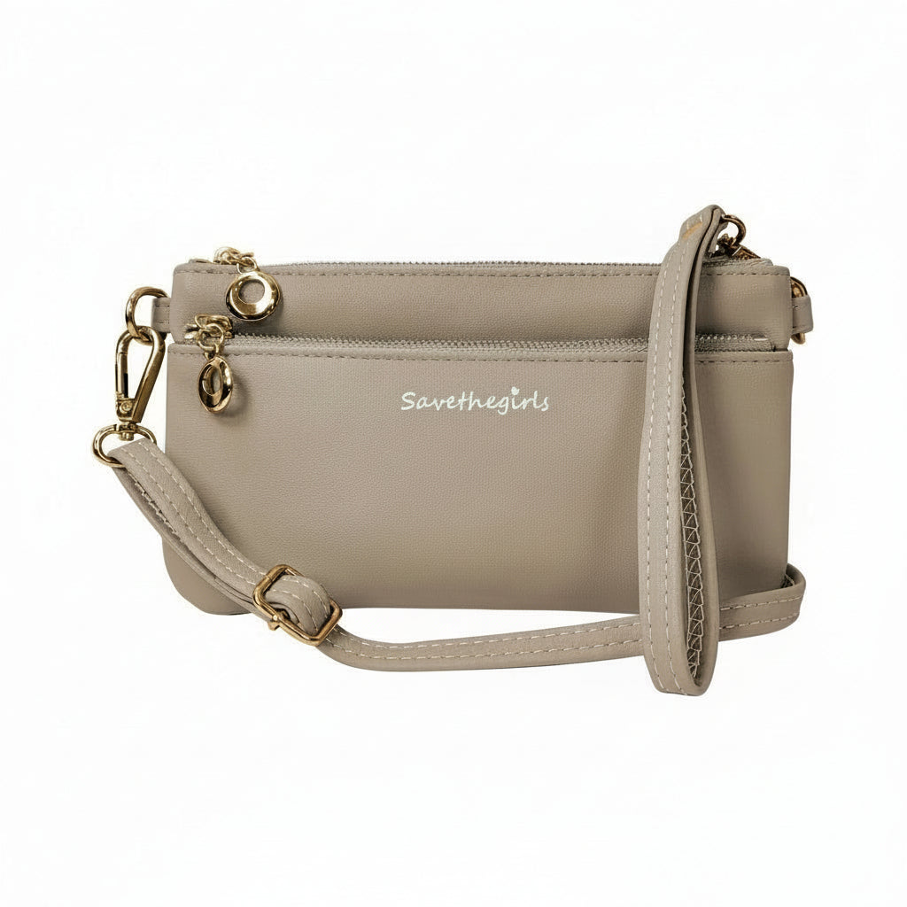 Beige handbag with a strap on a white background, featuring 'Save The Girls' branding.