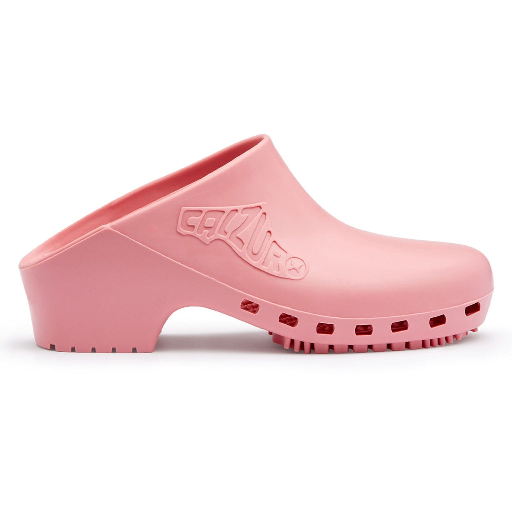 Pink clog shoe on a white background