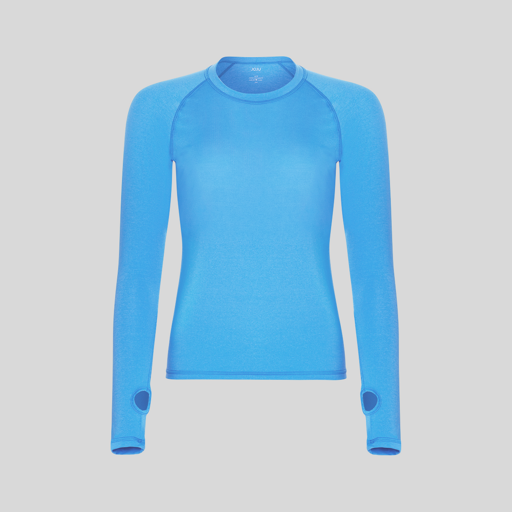 Blue long-sleeve shirt on a light gray background