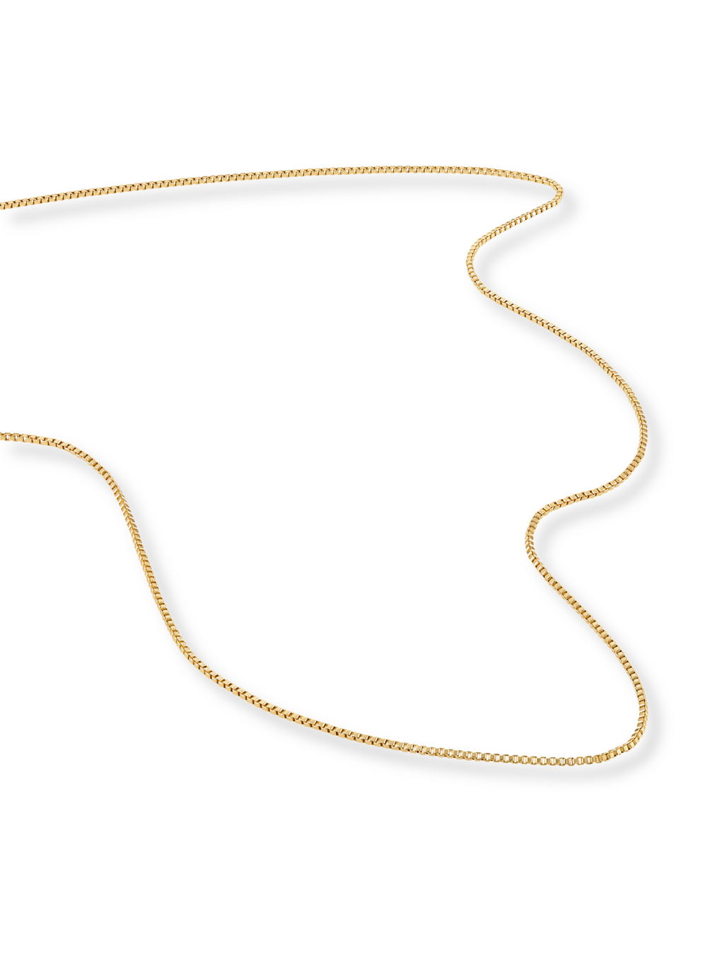 Gold chain necklace on a white background