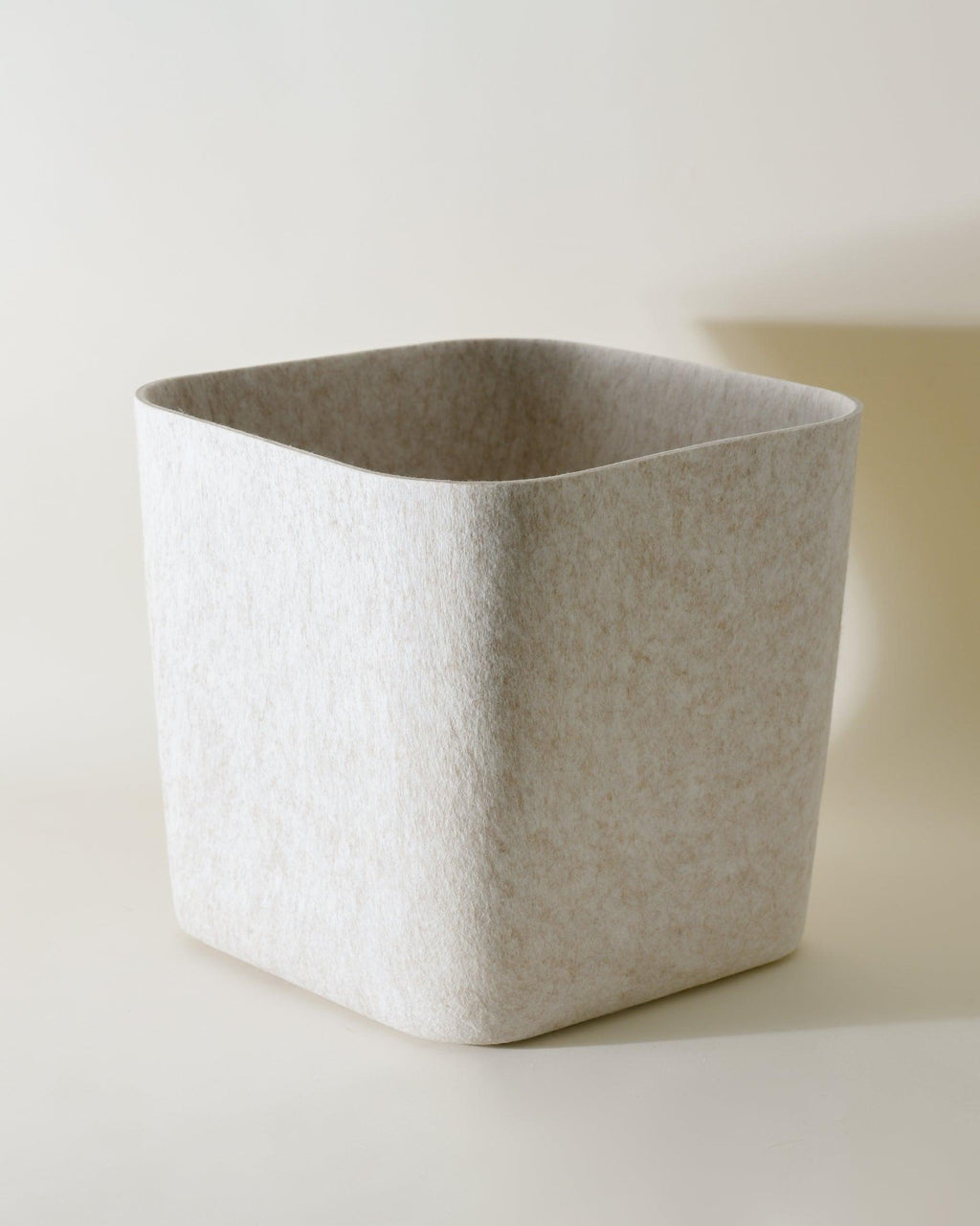 Square woven basket on a light background