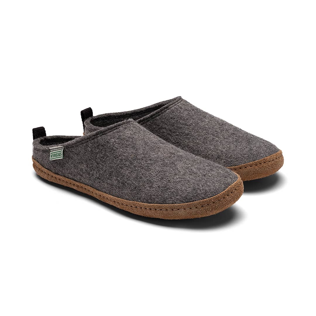 Pair of gray slippers with brown soles on a white background