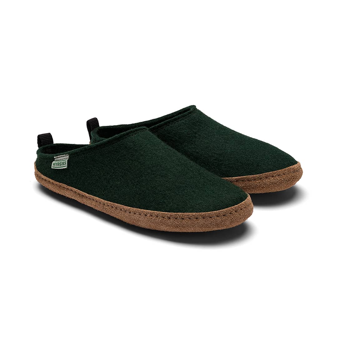 Pair of green slippers with brown soles on a white background